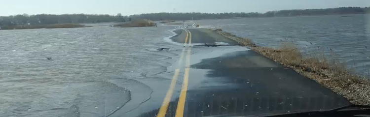 ocean flooding onto street